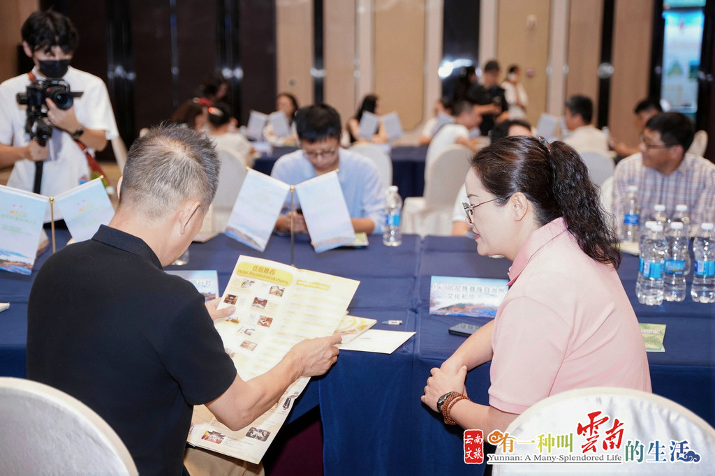 两地文旅同行洽谈交流。主办方供图
